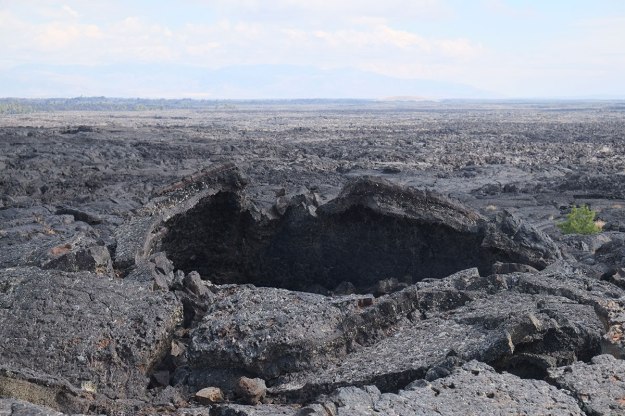 Greta discovers what is clearly the entrance to the Bat Cave,