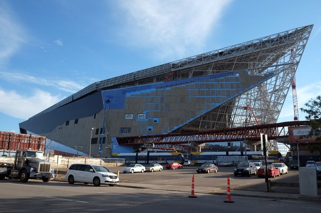 the new stadium appears to be a kaiju rising out of the rift