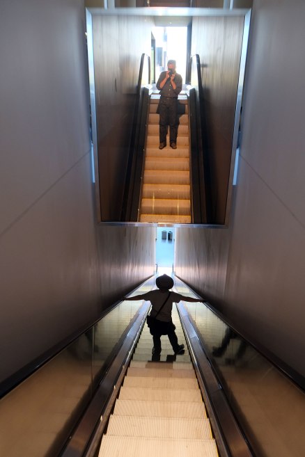 family portrait, on the second-longest escalator I've ever seen.