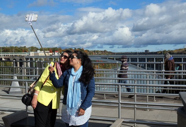 it doesn't matter if the Falls don't appear in your selfie, as long as the lighting makes you look good.