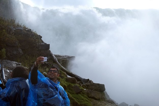 this guy is standing in a dead-end spot which seems to be reserved for selfie-takers