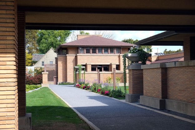 the backyard seen through the porte-cochere